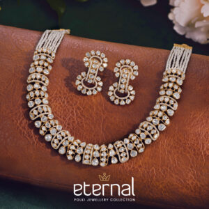 Polki diamond necklace set with layered white bead strands and matching earrings from Regal Jewellers' Polki Collection, showcasing traditional uncut diamond craftsmanship.