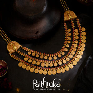 Chettinad long gold necklace with peacock motifs, 3-layer coin chains, and red ruby stones – Regal Jewellers.