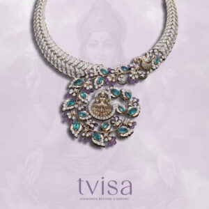 Tvīsa Diamond Collection necklace by Regal Jewellers featuring brilliant diamonds, emerald and amethyst gemstones, floral detailing, and a central deity motif — a handcrafted luxury statement piece.