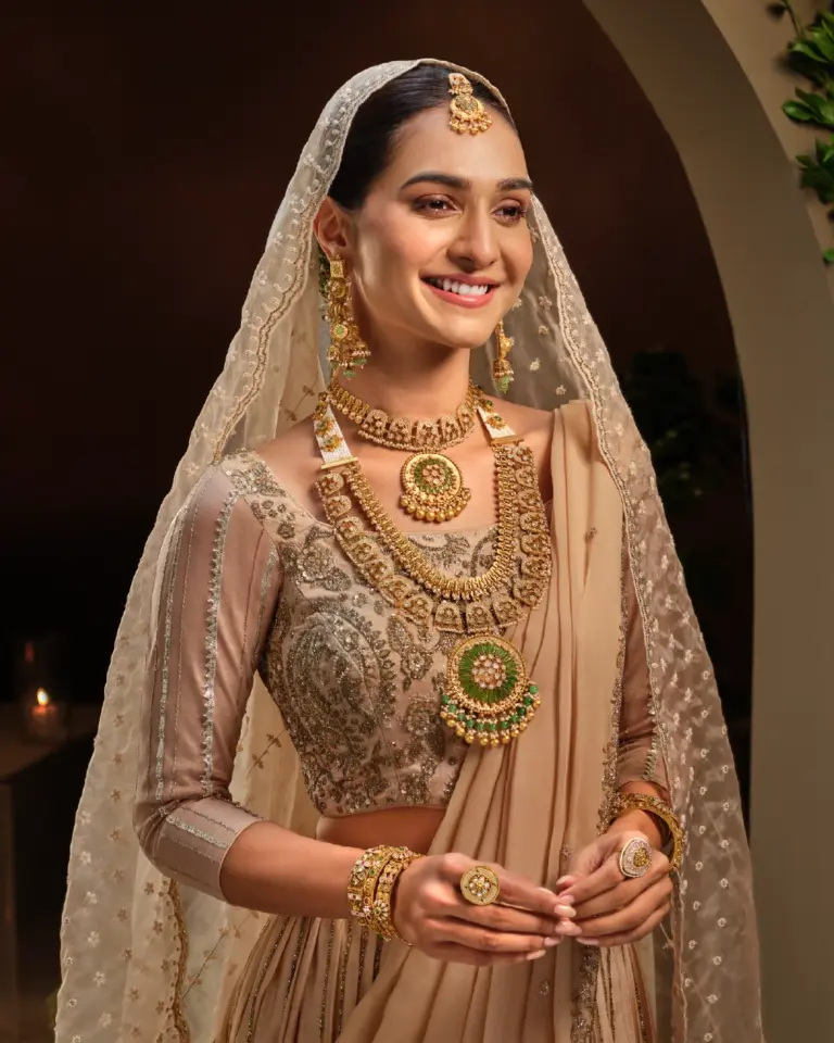 Traditional antique gold bridal jewellery from Regal Jewellers Navavadhu collection