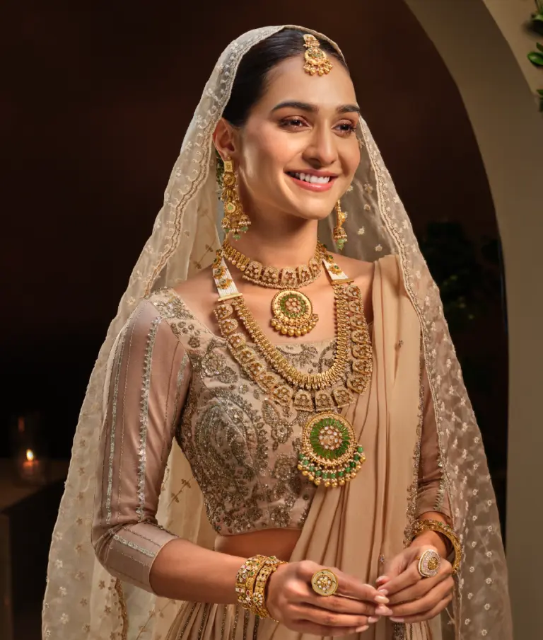 Indian bride wearing Navavadhu antique gold jewellery by Regal Jewellers