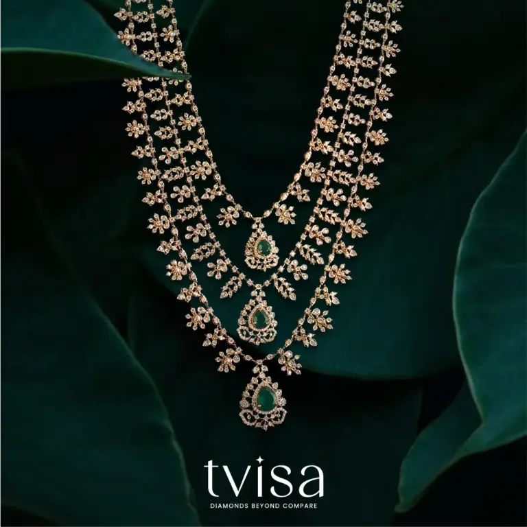 Tvisa layered diamond necklace with emerald green stone pendants
