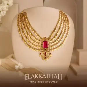 Elakkathali gold jewellery with traditional Kerala motifs and red stone detailing by Regal Jewellers